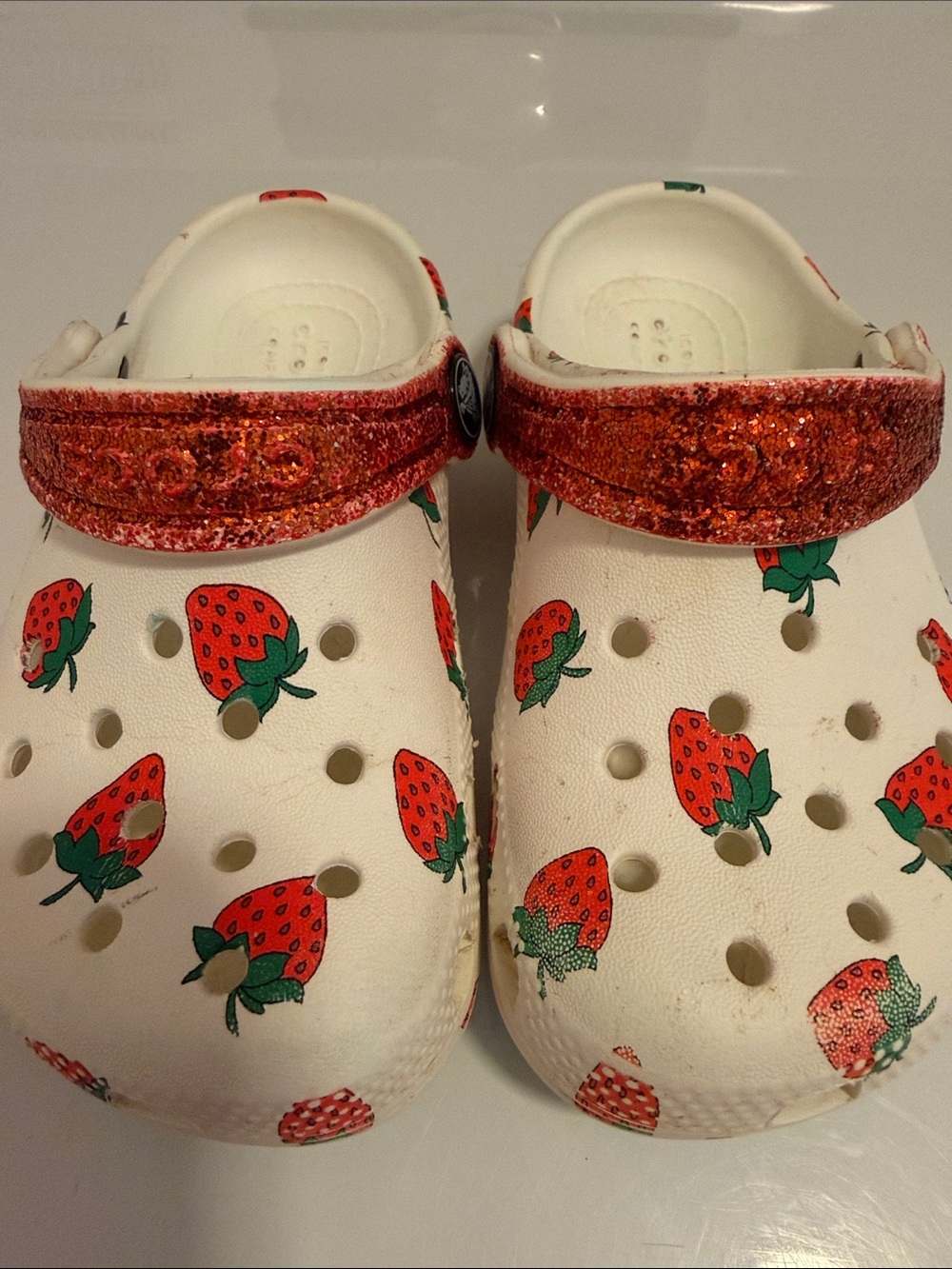 CROCS Kids White Clogs with Red Strawberry Print and Glitter Strap